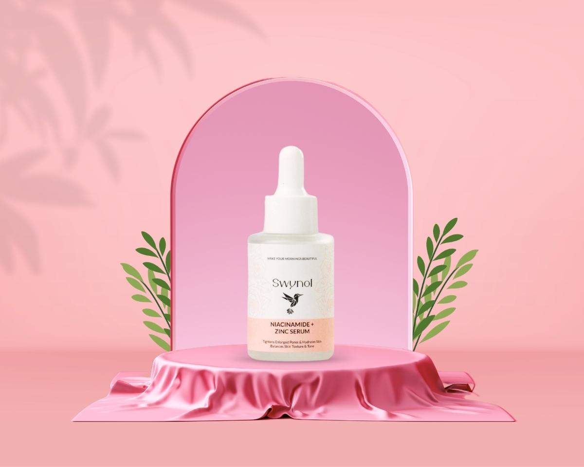 A sleek serum bottle featuring Niacinamide, Zinc, and Hyaluronic Acid, placed beside its box to highlight clean, modern skincare packaging.