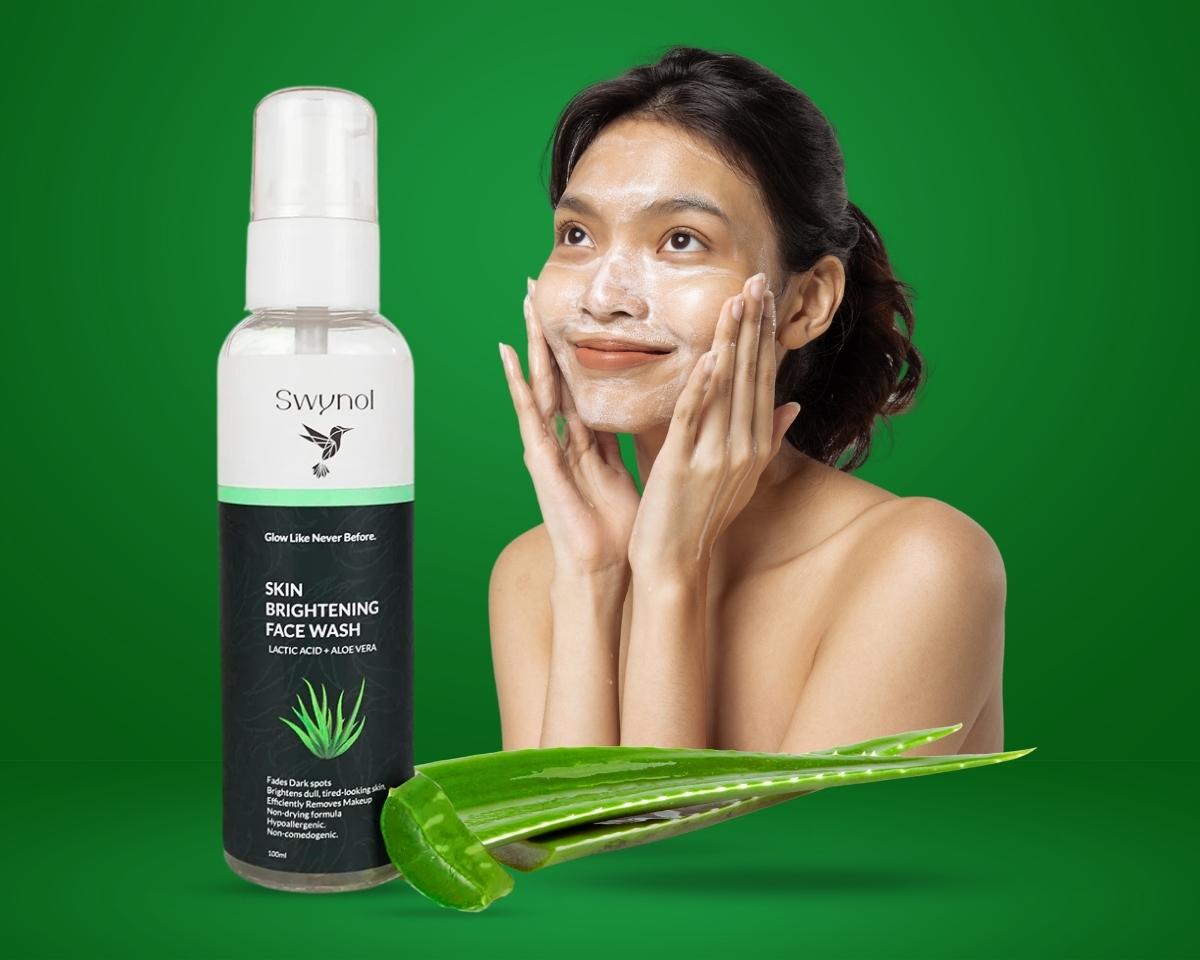 Face Wash with Aloe Vera & Lactic Acid shown on skin, targeting concerns like dullness and dryness with its soothing and gentle exfoliating formula.